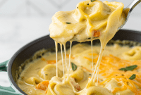 Velvety Smoked Gouda Chicken Tortellini Soup with Crispy Sage