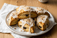 Golden Brown Butter Scones with Almonds, Tart Cranberries, and Zesty Orange Glaze