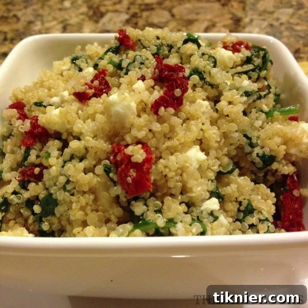 Recipe: Sundried Tomato & Spinach Quinoa, a healthy Mediterranean-inspired side dish with feta cheese.