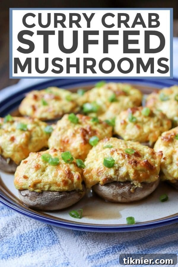 Curry Crab Stuffed Mushrooms are full of unique flavors, perfect for parties, game day, and weekend dinners. A gourmet appetizer featuring savory crab and aromatic curry. #appetizer #mushroom #seafood #crab #stuffedmushrooms