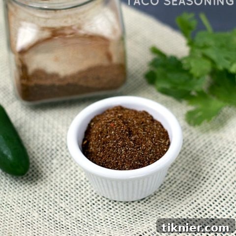 Homemade Taco Seasoning ingredients blended together in a bowl, ready for storage.