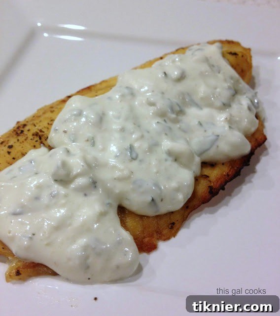 Close-up of grilled tilapia with sauce