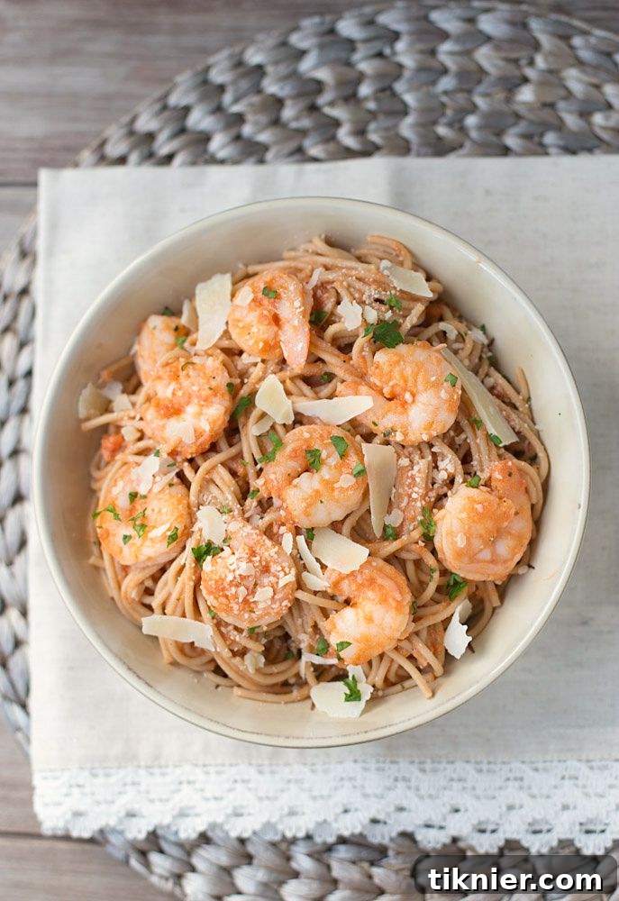 A stunning overhead shot of Shrimp Pasta with Spicy Tomato Cream Sauce in a serving bowl