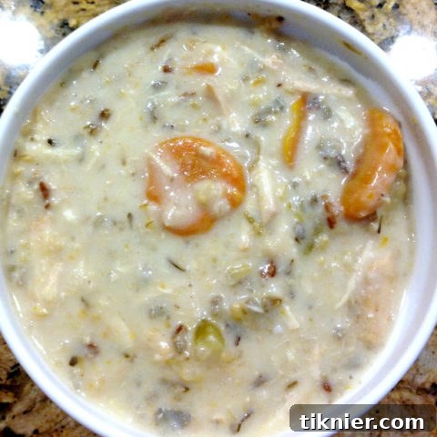 Crockpot Creamy Chicken Wild Rice Soup with a rich texture and vibrant ingredients