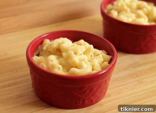 Close-up of baked Rosemary Pancetta Macaroni and Cheese, with bubbly cheese