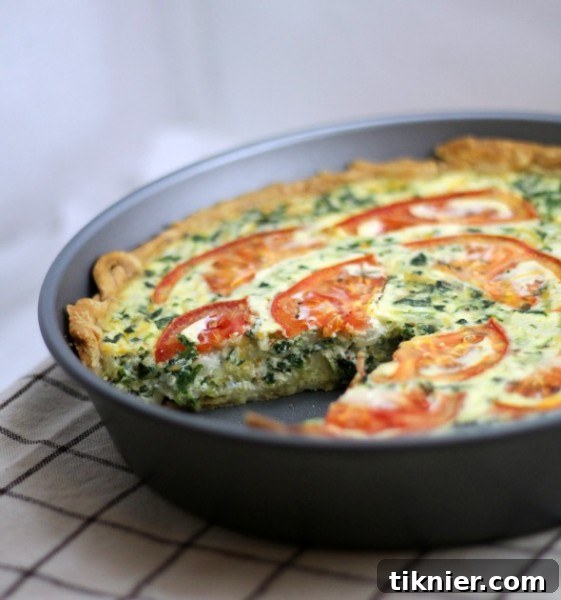 Farmhouse Tomato Bacon Spinach Quiche 2 Tomato Bacon and Spinach Quiche - A savory delight for any meal.