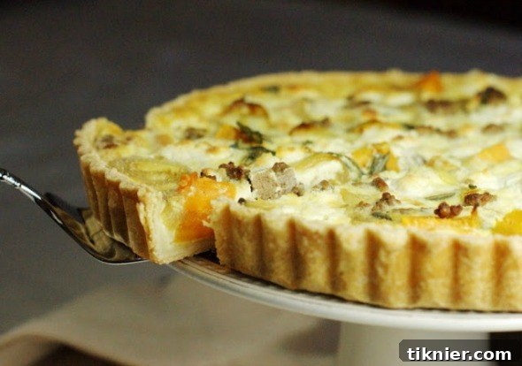Flavorful Roasted Sweet Potato & Sausage Quiche by The Kitchen is My Playground, a hearty and unique brunch or dinner option.