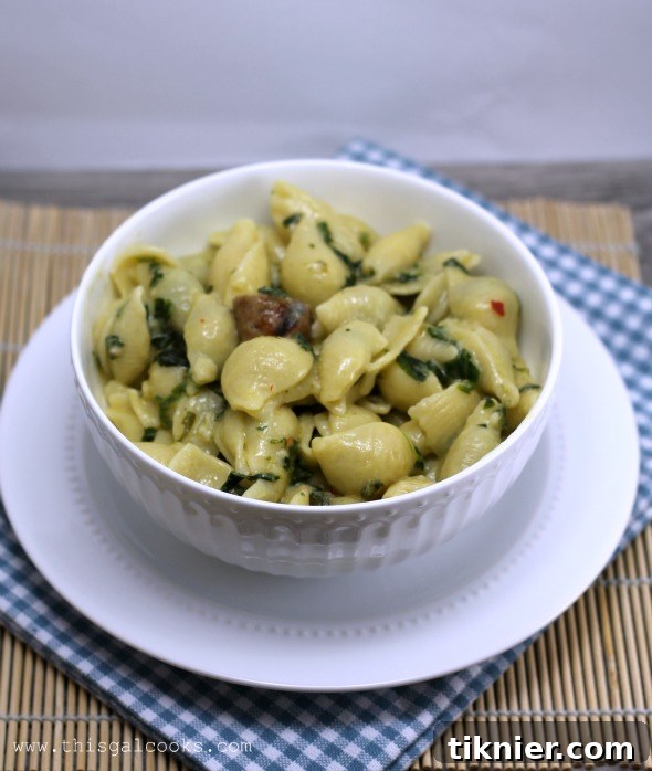 Close-up of Simple Spinach and Sausage Pasta, highlighting the creamy sauce and perfectly cooked ingredients.