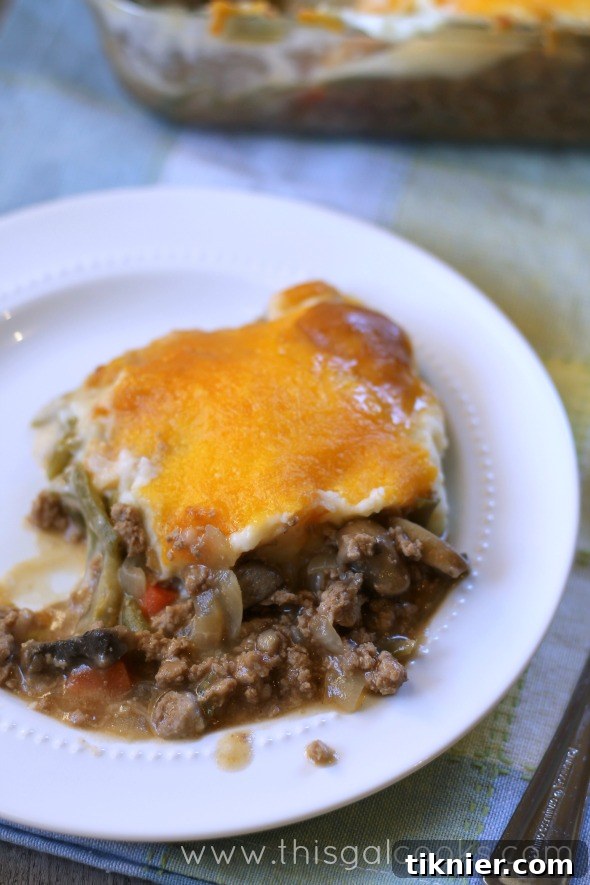 Rich and creamy Guinness Turkey Shepherd's Pie, topped with golden mashed potatoes and melted cheddar cheese. A wholesome and satisfying meal for the whole family.