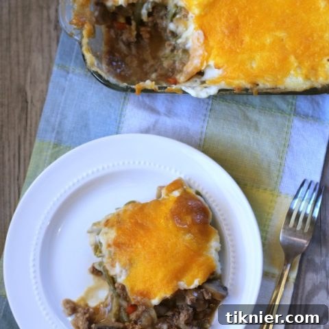 Recipe: Guinness Turkey Shepherd's Pie - A hearty casserole with ground turkey, vegetables, Guinness stout, and a cheesy mashed potato topping.