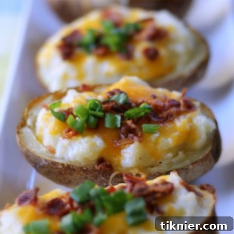 Twice Baked Potatoes, golden brown with melted cheese and crisp bacon