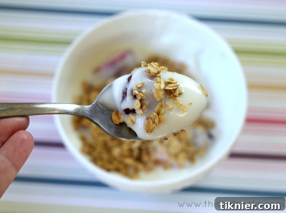 Healthy Fresh Fruit Yogurt Parfait, a perfect breakfast or snack option layered with fresh berries, granola, and creamy yogurt.