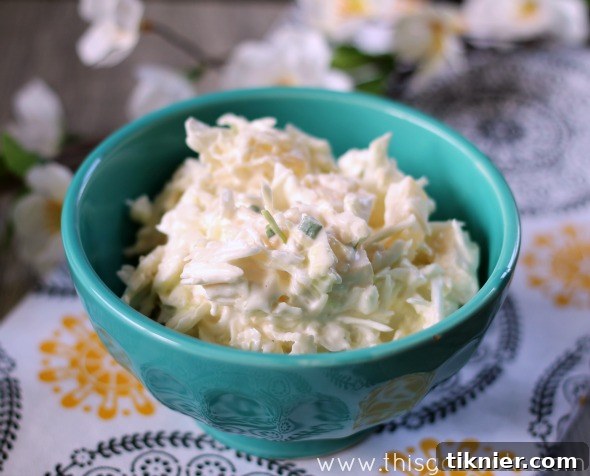 Sweet and Spicy Pineapple Slaw, a refreshing side dish with a tropical twist, perfect for barbecues.