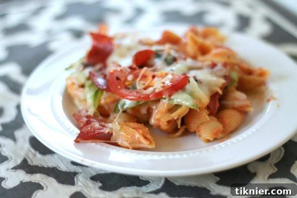Cheesy Pizza Pasta Casserole - a comforting baked pasta dish with pizza flavors.
