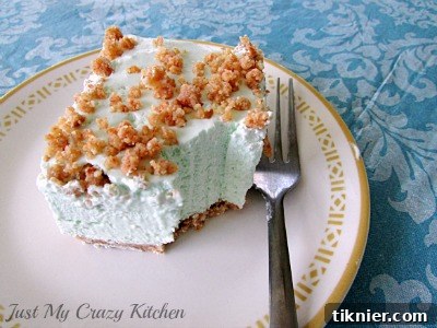 A light, airy, and refreshing Lime Chiffon dessert, presented in a delicate glass, embodying the essence of a perfect summer treat.