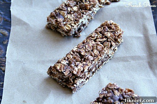 Wholesome and chewy No Bake Chocolate Chip Granola Bars, packed with oats and chocolate, sliced into ready-to-eat squares.