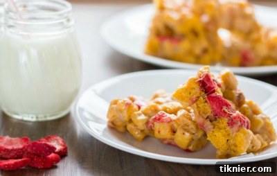 Playful Cap'n Crunch PB&J Treats, featuring the iconic cereal mixed with peanut butter and jelly, creating a fun, no-bake, and nostalgic snack.