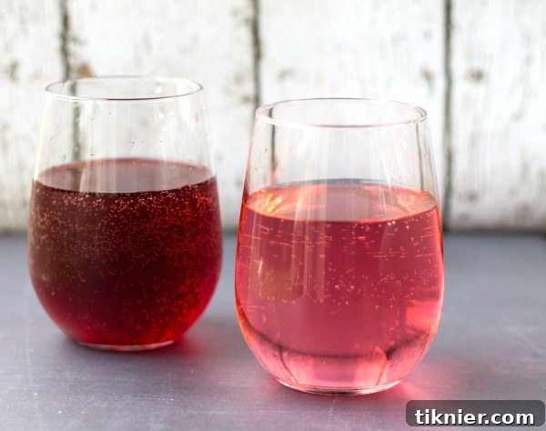 A vibrant selection of Glaceau Fruitwater bottles, including Black Raspberry and Watermelon Punch, showcasing refreshing flavor options