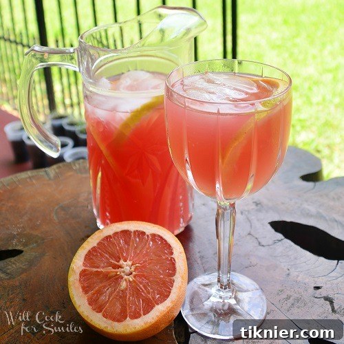 Pitcher of refreshing Grapefruit Sangria with fruit slices