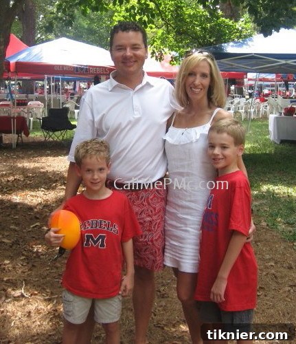 Paula, the author behind Call Me PMc, posing with her family.