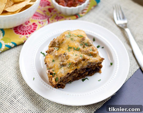 Effortless Cheesy Taco Bake 3 Top-down view of a Quick and Easy Cheesy Taco Casserole in a baking dish
