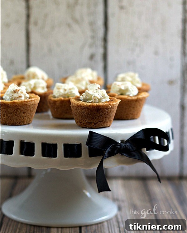 Pumpkin Pie Cookie Cups arranged neatly, ready to be enjoyed as a festive dessert.
