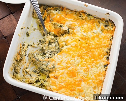 Classic Warm Spinach & Artichoke Dip, a holiday party favorite that's always a hit.