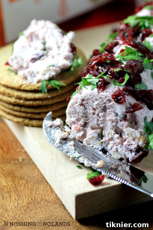 Elegant Cranberry Port Goat Cheese Log, a festive and easy holiday appetizer idea.