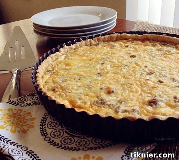 Delicious Sausage Egg and Cheese Quiche Tart, perfect for brunch.