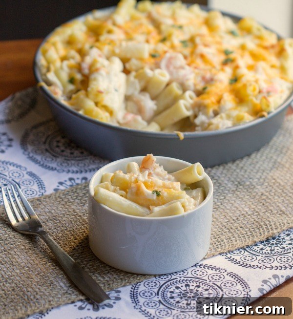 Generous serving of Seafood Enchilada Pasta Bake, garnished with fresh cilantro, a perfect comfort food dish.