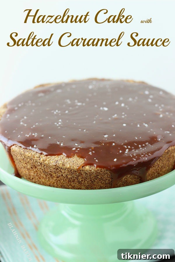 A generous serving of Hazelnut Cake with Salted Caramel Sauce on a white plate