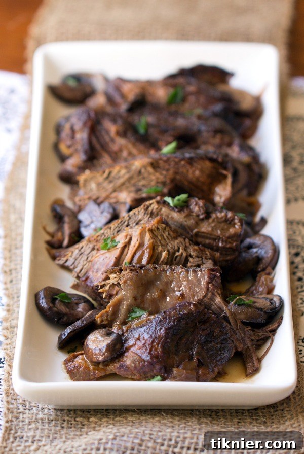 Crock Pot Beef Burgundy is my ultimate comfort food recipe. Easy to make and perfectly paired with rice or mashed potatoes for a satisfying meal. | This Gal Cooks