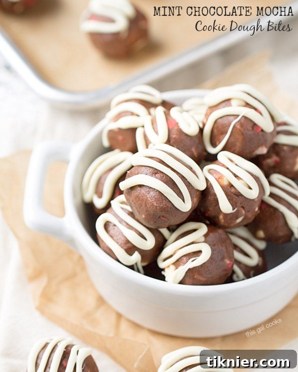 Mint Chocolate Mocha Cookie Dough Bites by This Gal Cooks - A vertical shot of several finished cookie dough bites on a surface, highlighting the drizzle.