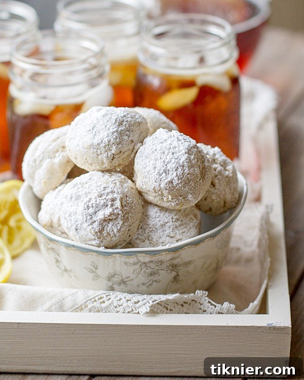 Close-up of Lemon Poppyseed Tea Cookies, stacked beautifully