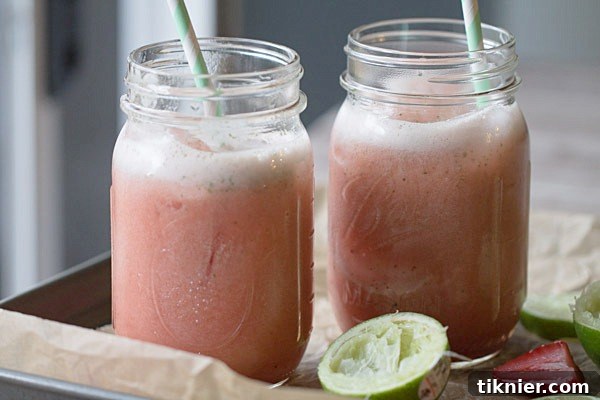 Ingredients for Strawberry Lime Mint Spritzers laid out: Fruttare bars, lime, and mint