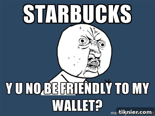 A close-up of a Caramel Macchiato with a heart drawn in the foam, representing coffee love.