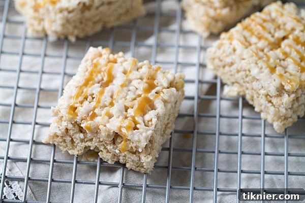 Close-up of Caramel Macchiato Krispie Treats, showing the golden crispy rice and caramel drizzle.