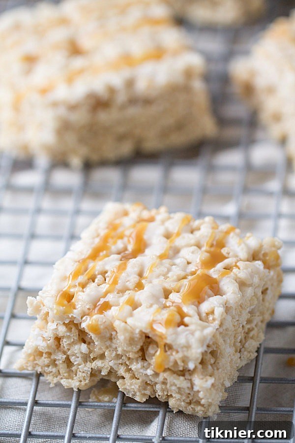 Caramel Macchiato Krispie Treats served on a rustic wooden board, ready to be enjoyed.