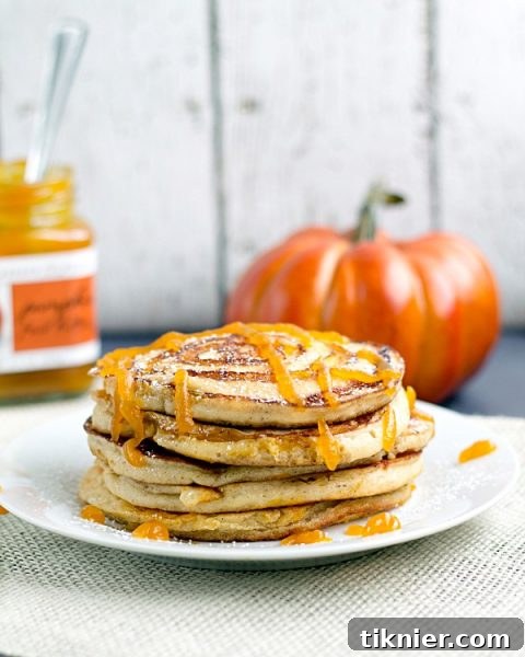Delicious Pumpkin Swirl Pancakes with Pumpkin Butter Topping