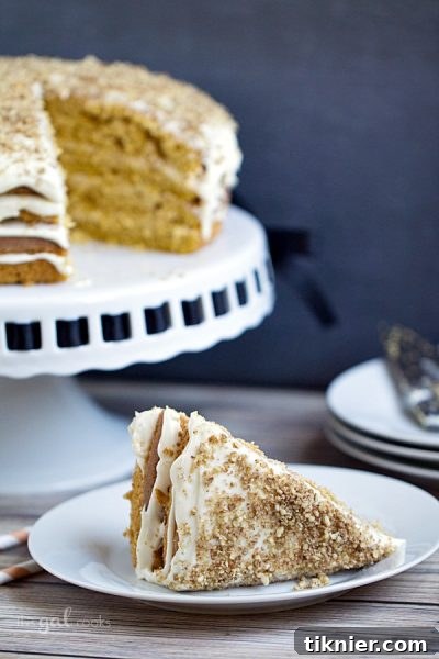 Decadent Pumpkin Spice Cake with Maple Bourbon Frosting
