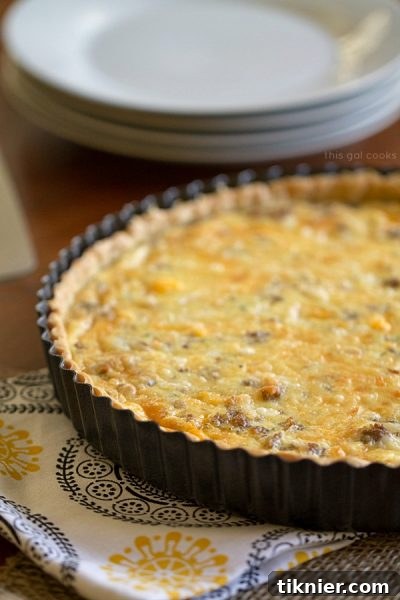 Classic Sausage, Egg, and Cheese Quiche Tart - Elegant Brunch Idea