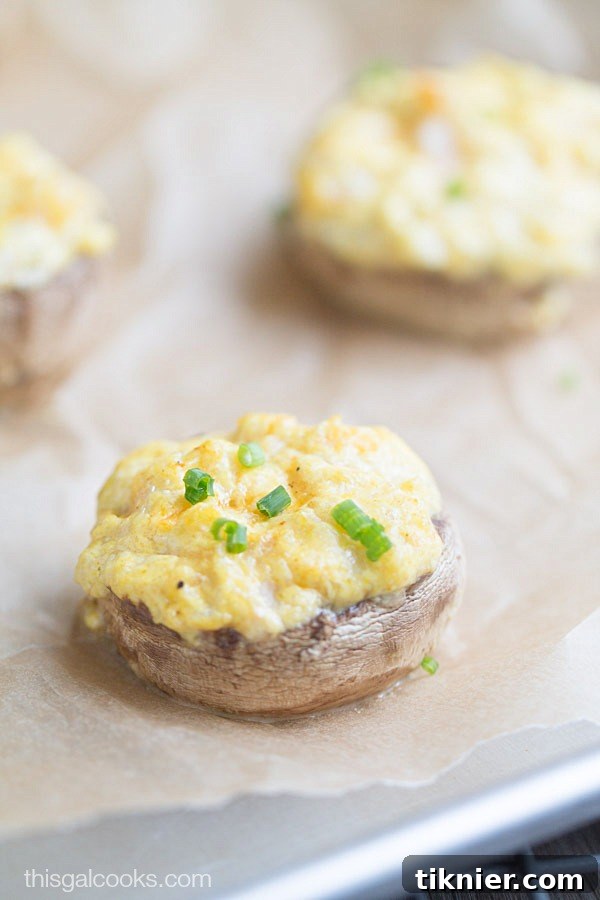 Zesty Curried Shrimp Mushroom Caps 7 Close up of a plate of Curry Shrimp Stuffed Mushrooms, perfectly baked and ready to serve.