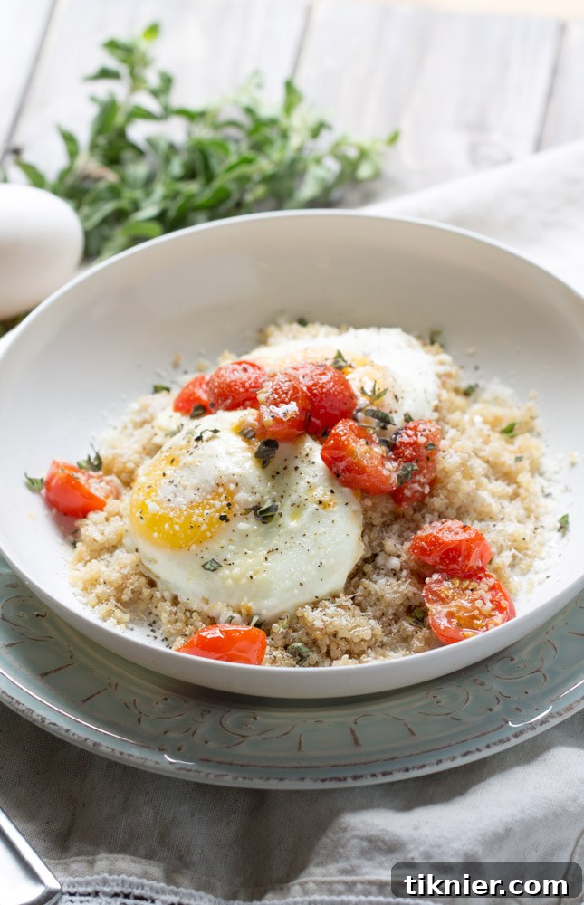 Delicious Quinoa Breakfast Bowl with Eggs and Roasted Tomatoes