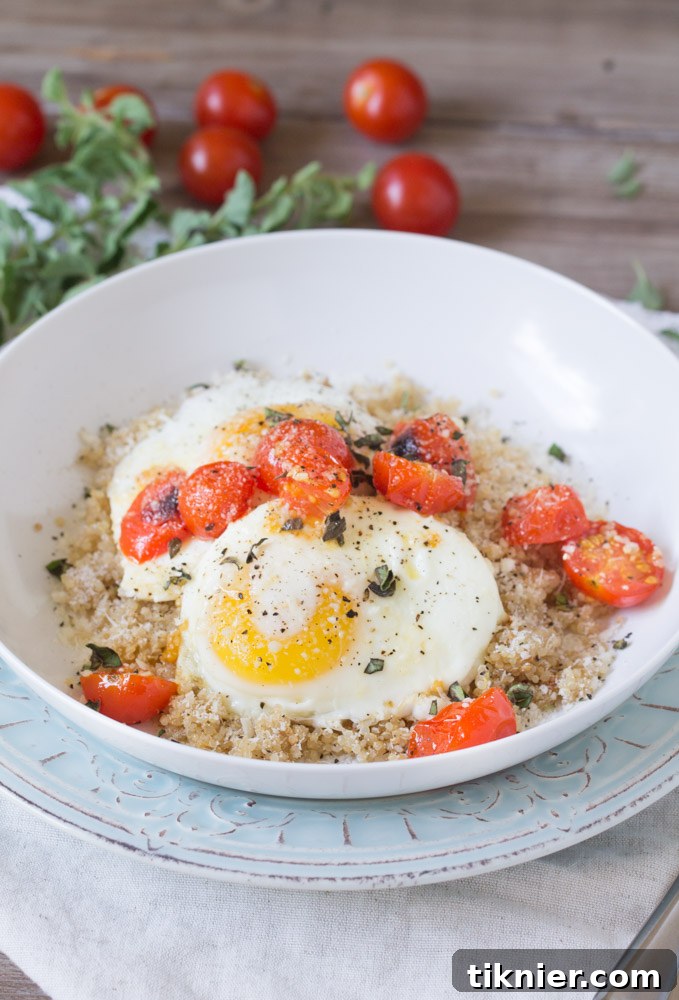 Ready-to-eat Quinoa Breakfast Bowl with Eggs and Roasted Tomatoes