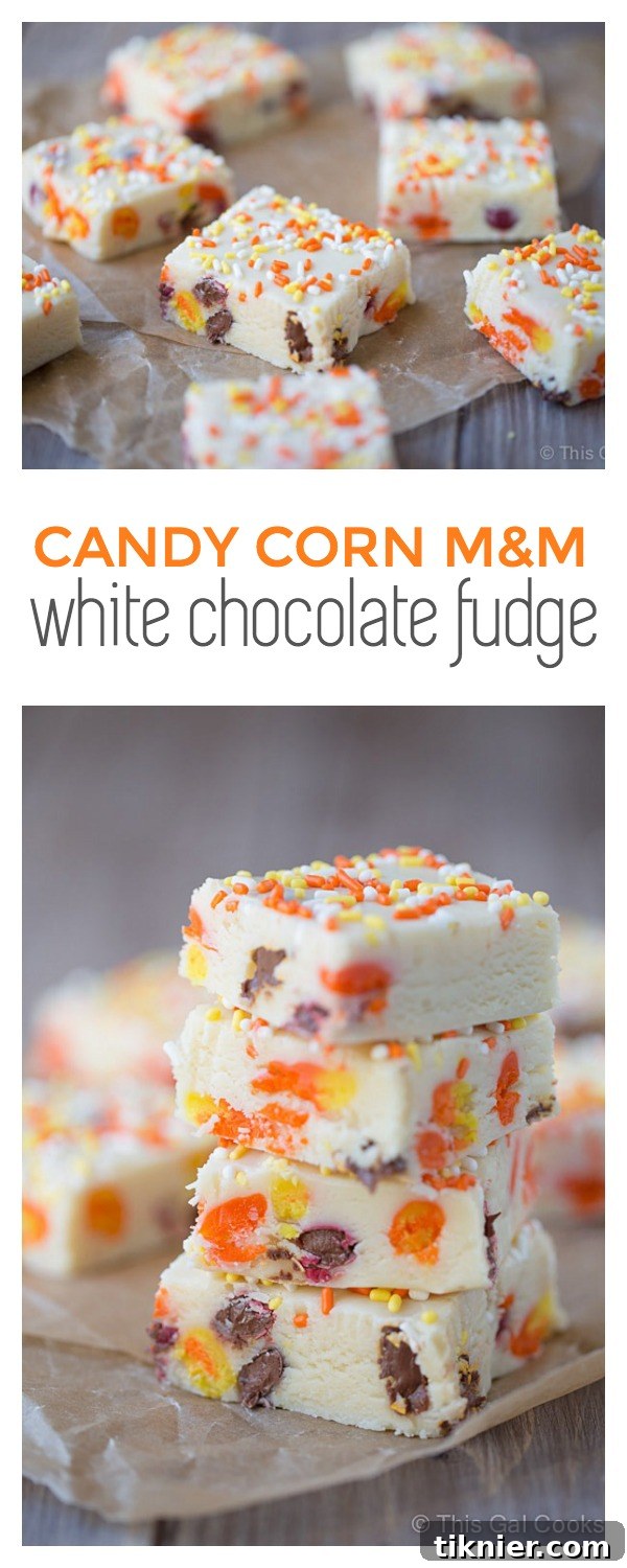Two pieces of Candy Corn M&M White Chocolate Fudge artfully stacked on a white background.