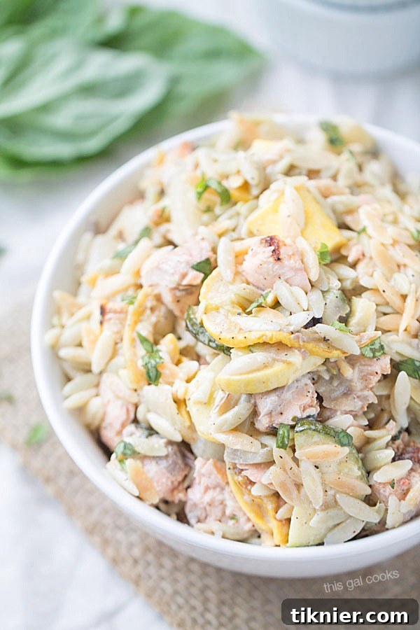 Healthy and delicious Grilled Salmon and Vegetable Orzo Salad, perfect for using leftovers.