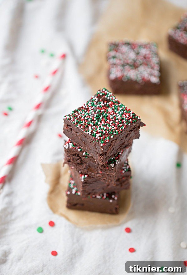 Easy-to-make Chocolate Peppermint Fudge, a festive and delightful treat perfect for sharing during the Christmas season and an excellent holiday gift.