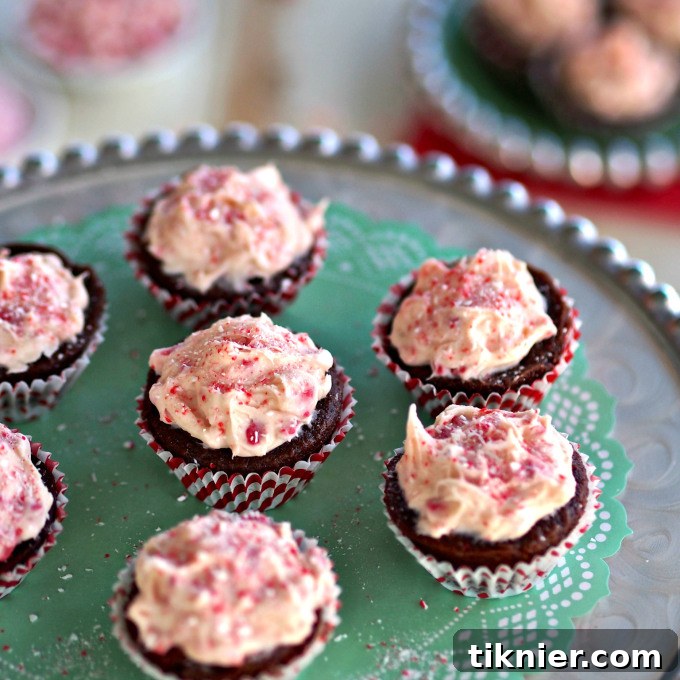 40+ Chocolate Peppermint Treats 11 Elegant White Chocolate Peppermint Cupcakes, a delightful holiday dessert from Simply Sated