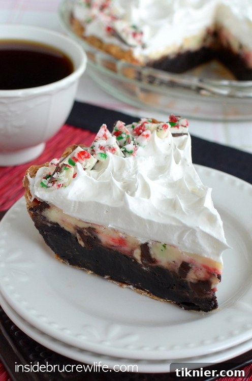 40+ Chocolate Peppermint Treats 23 Peppermint Bark Cheesecake Brownie Pie, a decadent holiday dessert by Inside BruCrew Life