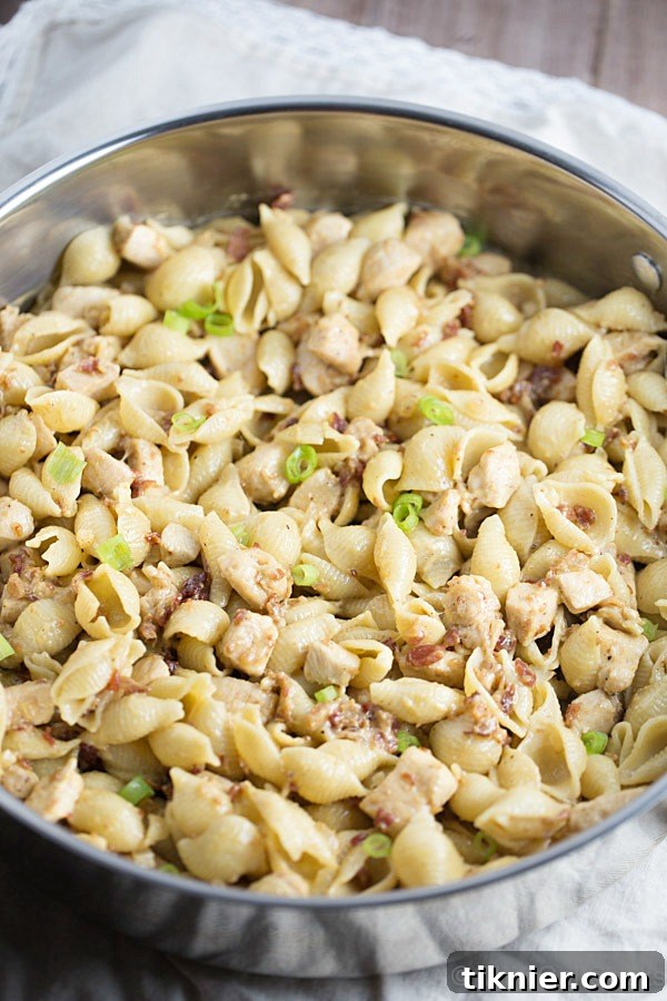 Honey Mustard Chicken Bacon Pasta Skillet 3 One Pan Chicken Bacon Honey Mustard Pasta is a delicious and simple one pot meal that's perfect for those busy weeknights. Creamy honey mustard is tossed with chicken, bacon, swiss and pasta. It's comfort food in a pan!